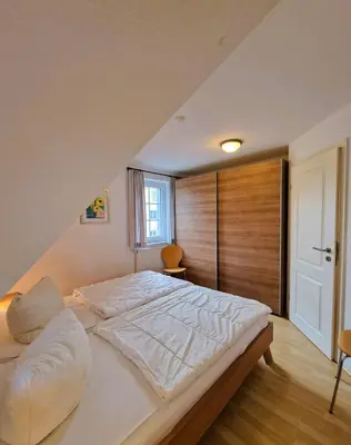 Ein Bett oder Betten in einem Zimmer der Unterkunft Mine Heimat 
