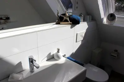 Ein Badezimmer in der Unterkunft Carpe Diem