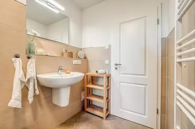 Ein Badezimmer in der Unterkunft Leuchtturm, Wohnung 14
