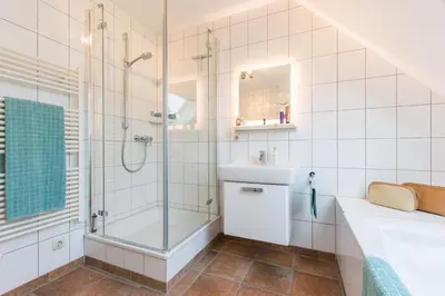Ein Badezimmer in der Unterkunft Rämel Haus 