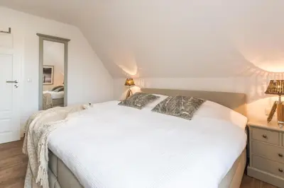 Ein Bett oder Betten in einem Zimmer der Unterkunft Schulstr.28 