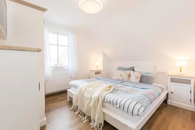 Ein Bett oder Betten in einem Zimmer der Unterkunft Schulstr.28 