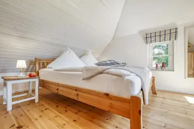Ein Bett oder Betten in einem Zimmer der Unterkunft altes Schifferhaus Paries