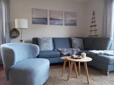 Ein Sitzbereich in der Unterkunft FERIENHAUS SOMMERTRAUM - KINDERFREUNDLICH - 3 Schlafzimmer, Garten, Bad und G-WC, Kaminofen
