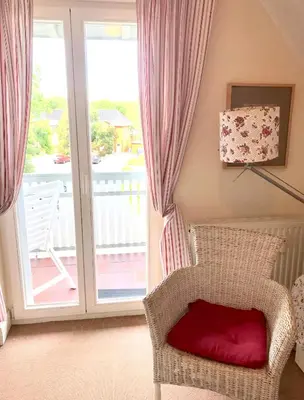 Ein Sitzbereich in der Unterkunft Ferienwohnung Spatzennest