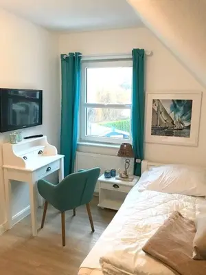 Ein Bett oder Betten in einem Zimmer der Unterkunft Wiesenstrasse