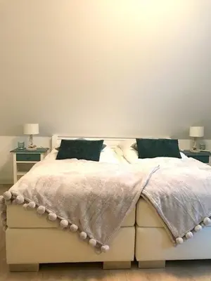 Ein Bett oder Betten in einem Zimmer der Unterkunft Wiesenstrasse