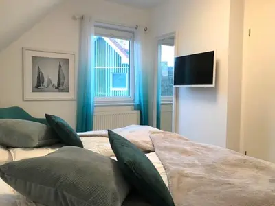 Ein Bett oder Betten in einem Zimmer der Unterkunft Wiesenstrasse