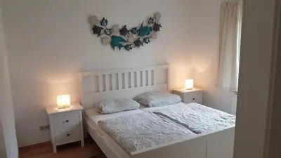 Ein Bett oder Betten in einem Zimmer der Unterkunft 