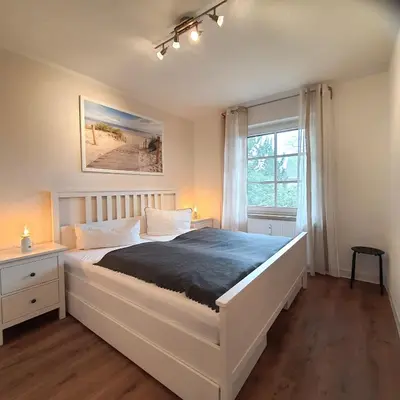 Ein Bett oder Betten in einem Zimmer der Unterkunft 