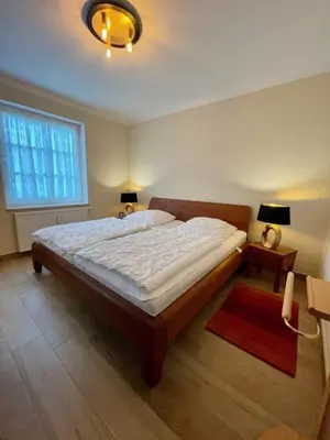 Ein Bett oder Betten in einem Zimmer der Unterkunft 