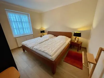 Ein Bett oder Betten in einem Zimmer der Unterkunft 