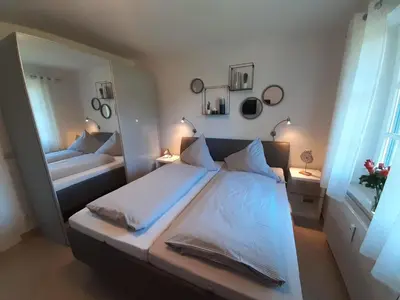 Ein Bett oder Betten in einem Zimmer der Unterkunft 