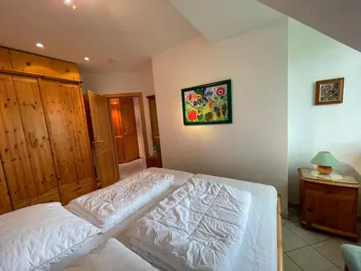 Ein Bett oder Betten in einem Zimmer der Unterkunft Alte Reihe 9 Wohnung 5