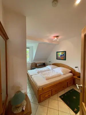 Ein Bett oder Betten in einem Zimmer der Unterkunft Alte Reihe 9 Wohnung 5
