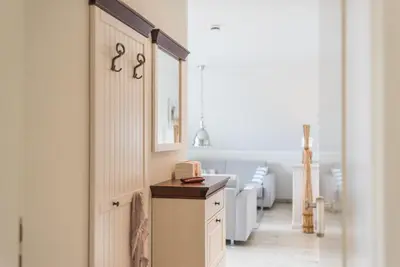 Ein Bett oder Betten in einem Zimmer der Unterkunft Alte Reihe 7 Wohnung 3 Ostseeperle