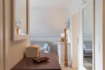 Ein Bett oder Betten in einem Zimmer der Unterkunft Alte Reihe 7 Wohnung 3 Ostseeperle