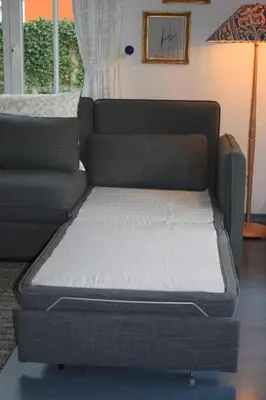 Ein Bett oder Betten in einem Zimmer der Unterkunft Alte Reihe 9 Wohnung 1