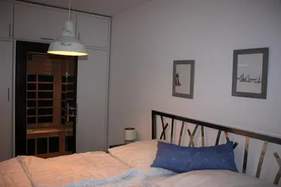 Ein Bett oder Betten in einem Zimmer der Unterkunft Alte Reihe 9 Wohnung 1