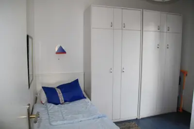 Ein Bett oder Betten in einem Zimmer der Unterkunft Alte Reihe 9 Wohnung 1