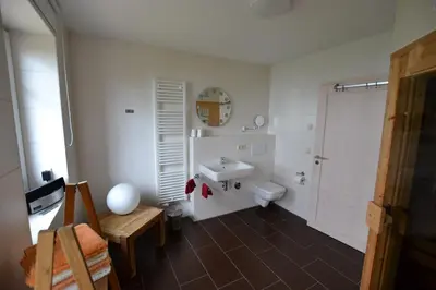 Ein Badezimmer in der Unterkunft Ferienhaus Dine