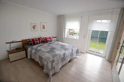 Ein Bett oder Betten in einem Zimmer der Unterkunft Ferienhaus Dine
