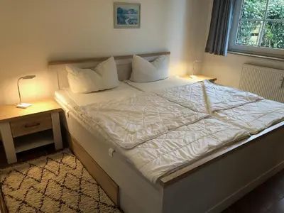 Ein Bett oder Betten in einem Zimmer der Unterkunft Bahnhofstr.11 Wohnungnr.4
