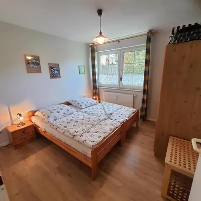 Ein Bett oder Betten in einem Zimmer der Unterkunft Bahnhofstr.11 Wohnungnr.2