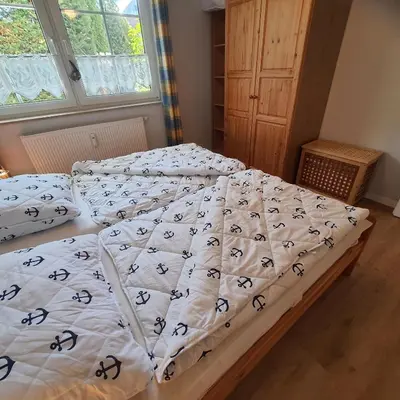 Ein Bett oder Betten in einem Zimmer der Unterkunft Bahnhofstr.11 Wohnungnr.2