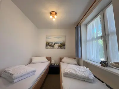 Ein Bett oder Betten in einem Zimmer der Unterkunft Sonneneck