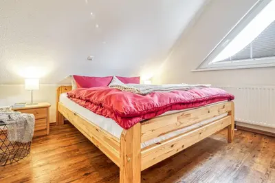 Ein Bett oder Betten in einem Zimmer der Unterkunft Glebbe 68 Whg.3