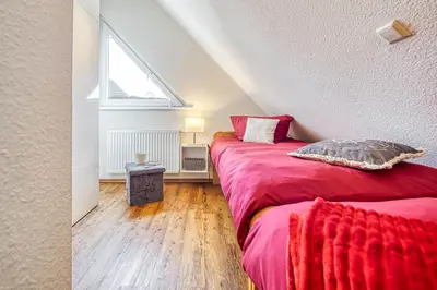 Ein Bett oder Betten in einem Zimmer der Unterkunft Glebbe 68 Whg.3