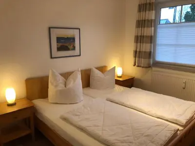 Ein Bett oder Betten in einem Zimmer der Unterkunft Bahnhofstr.13 Wohnung 2