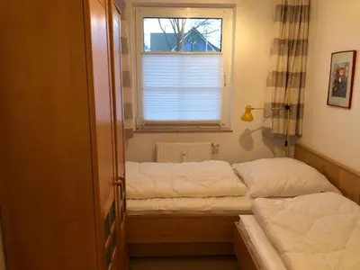 Ein Bett oder Betten in einem Zimmer der Unterkunft Bahnhofstr.13 Wohnung 2