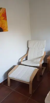 Ein Sitzbereich in der Unterkunft Alte Gärtnerei App Rhododendron