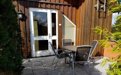 Ein Garten an der Unterkunft Alte Gärtnerei App Hortensie