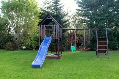 Ein Kinderspielbereich in der Unterkunft Alte Gärtnerei App Hortensie