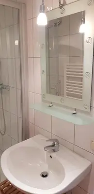 Ein Badezimmer in der Unterkunft Alte Gärtnerei App Akazie