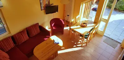 Ein Sitzbereich in der Unterkunft Alte Gärtnerei App Akazie