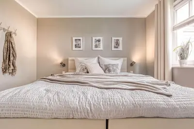 Ein Bett oder Betten in einem Zimmer der Unterkunft Fischländer 10