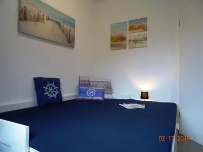 Ein Bett oder Betten in einem Zimmer der Unterkunft Birkenstr.14 a Wohnung 9
