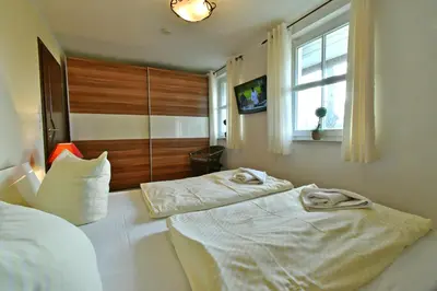 Ein Bett oder Betten in einem Zimmer der Unterkunft Sonnenschein 1