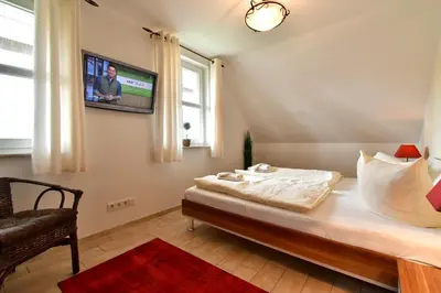 Ein Bett oder Betten in einem Zimmer der Unterkunft Sonnenschein 1