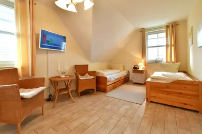 Ein Bett oder Betten in einem Zimmer der Unterkunft Sonnenschein 1