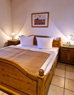 Ein Bett oder Betten in einem Zimmer der Unterkunft Birkenstr.17 A