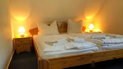 Ein Bett oder Betten in einem Zimmer der Unterkunft -