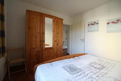 Ein Bett oder Betten in einem Zimmer der Unterkunft Strandlöper
