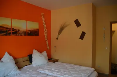 Ein Bett oder Betten in einem Zimmer der Unterkunft Birkenstr.21 C 