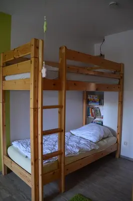 Ein Bett oder Betten in einem Zimmer der Unterkunft Birkenstr.21 C 