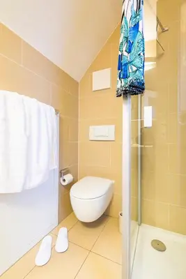 Ein Badezimmer in der Unterkunft Birkenstr.6 i WHG 10